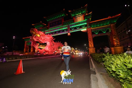 Race photo from PIK NITE RUN 2025