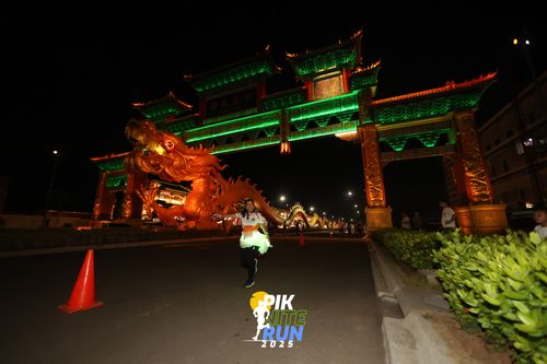 Race photo from PIK NITE RUN 2025