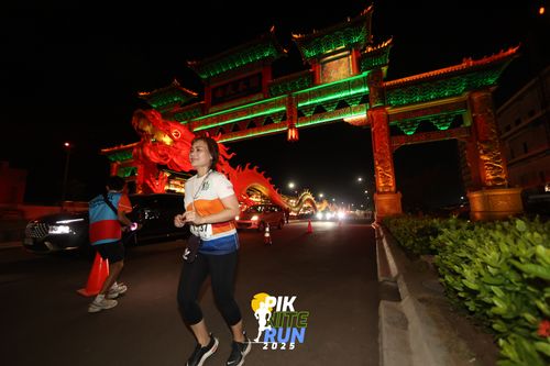 Race photo from PIK NITE RUN 2025