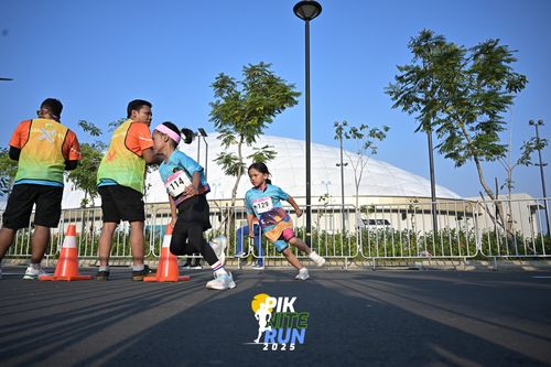 Race photo from PIK NITE RUN 2025