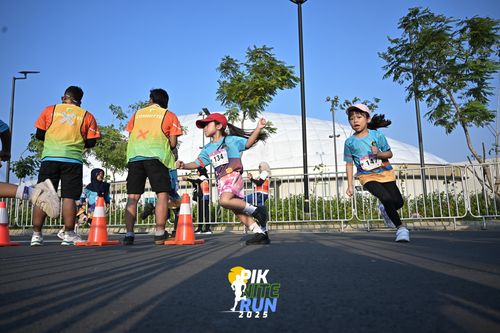 Race photo from PIK NITE RUN 2025