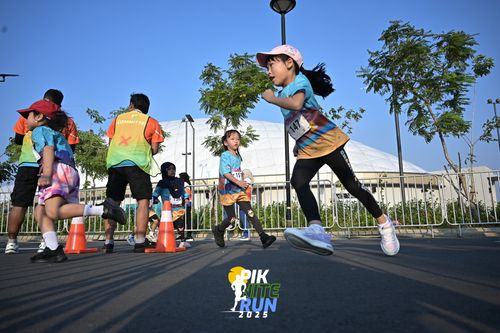 Race photo from PIK NITE RUN 2025
