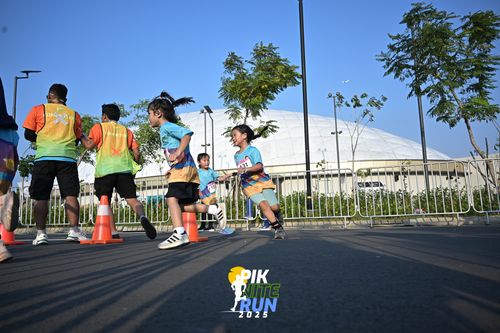Race photo from PIK NITE RUN 2025