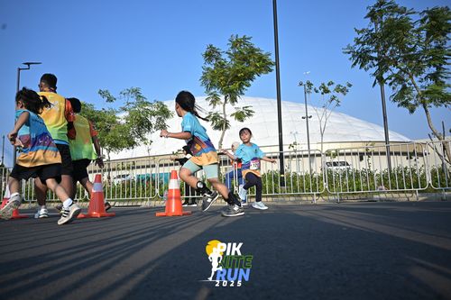 Race photo from PIK NITE RUN 2025
