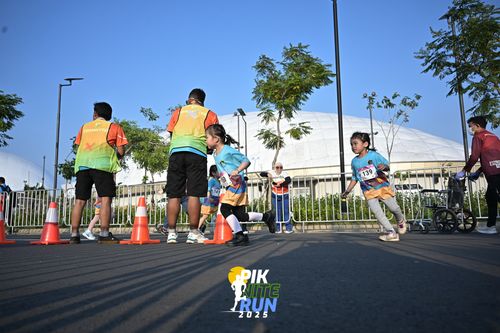Race photo from PIK NITE RUN 2025