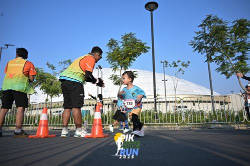 Race photo from PIK NITE RUN 2025