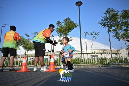 Race photo from PIK NITE RUN 2025