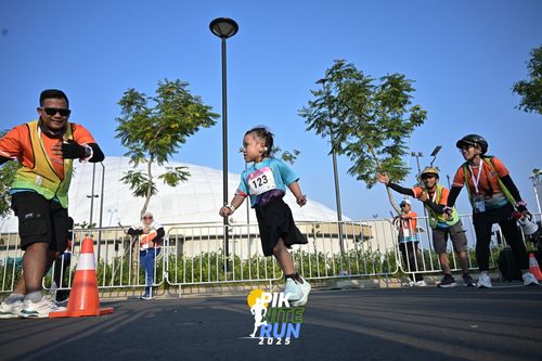 Race photo from PIK NITE RUN 2025