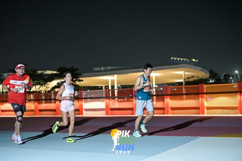 Race photo from PIK NITE RUN 2025