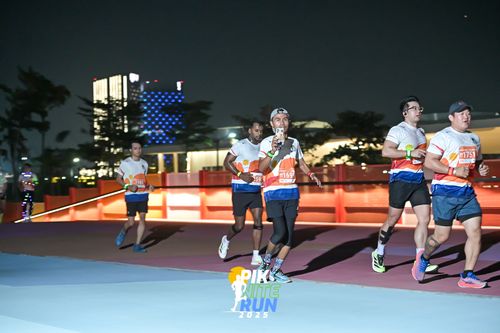 Race photo from PIK NITE RUN 2025