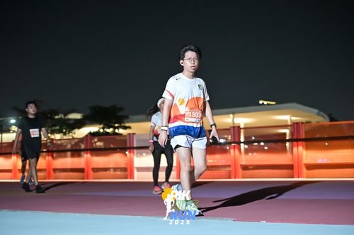 Race photo from PIK NITE RUN 2025
