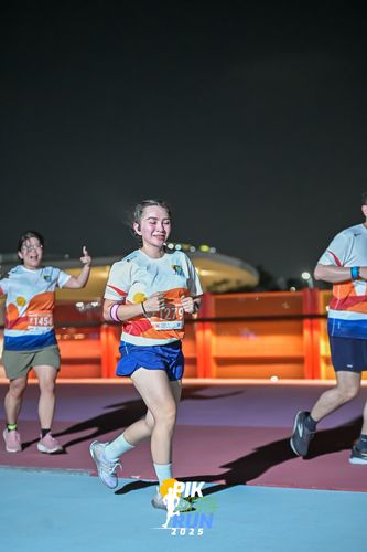 Race photo from PIK NITE RUN 2025