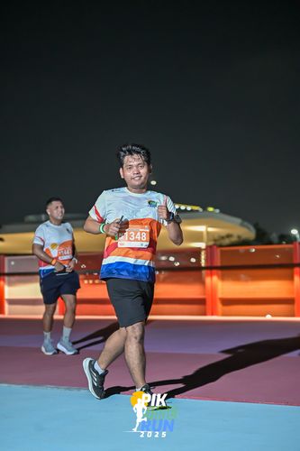 Race photo from PIK NITE RUN 2025