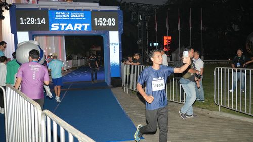 Race photo from KEMLU RUN 2025