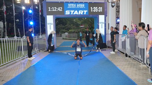 Race photo from KEMLU RUN 2025