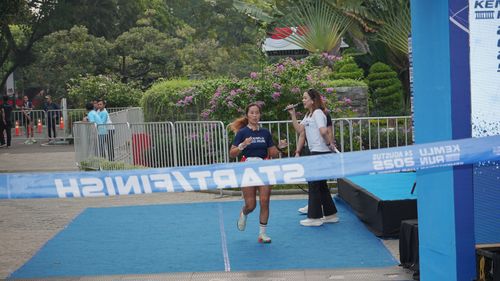 Race photo from KEMLU RUN 2025