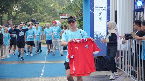 Race photo from KEMLU RUN 2025