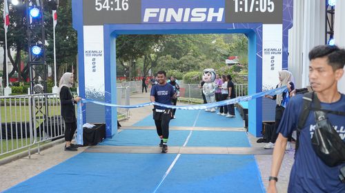 Race photo from KEMLU RUN 2025