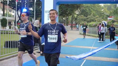 Race photo from KEMLU RUN 2025