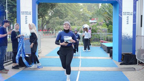 Race photo from KEMLU RUN 2025