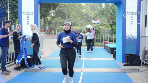 Race photo from KEMLU RUN 2025