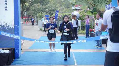 Race photo from KEMLU RUN 2025