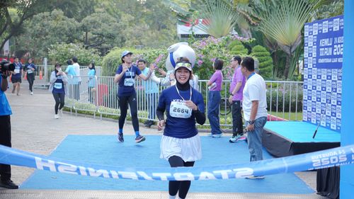 Race photo from KEMLU RUN 2025