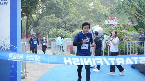 Race photo from KEMLU RUN 2025