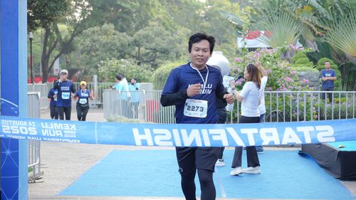 Race photo from KEMLU RUN 2025