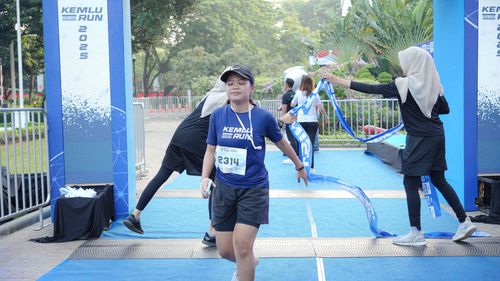 Race photo from KEMLU RUN 2025