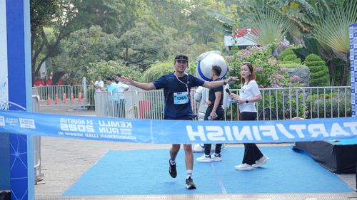 Race photo from KEMLU RUN 2025