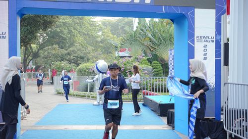 Race photo from KEMLU RUN 2025
