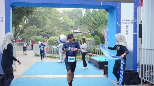 Race photo from KEMLU RUN 2025