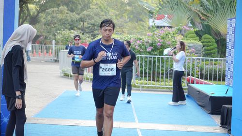 Race photo from KEMLU RUN 2025