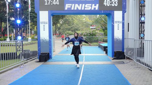 Race photo from KEMLU RUN 2025