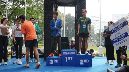 Race photo from KEMLU RUN 2025