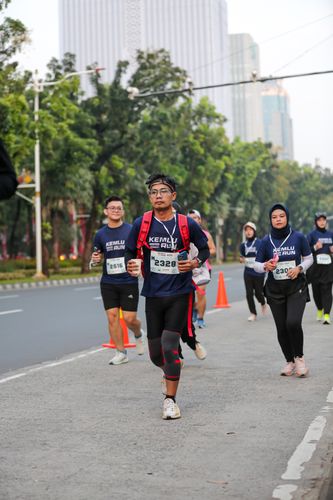 Race photo from KEMLU RUN 2025