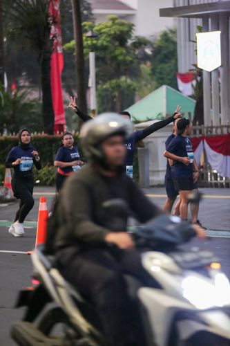 Race photo from KEMLU RUN 2025