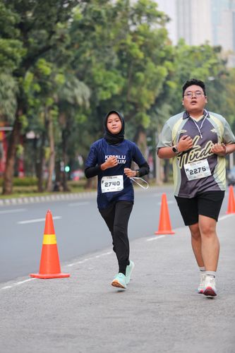 Race photo from KEMLU RUN 2025
