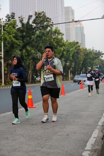 Race photo from KEMLU RUN 2025