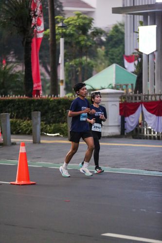 Race photo from KEMLU RUN 2025