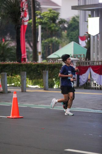 Race photo from KEMLU RUN 2025