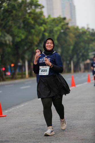 Race photo from KEMLU RUN 2025