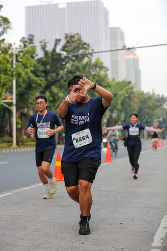 Race photo from KEMLU RUN 2025