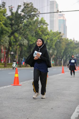 Race photo from KEMLU RUN 2025
