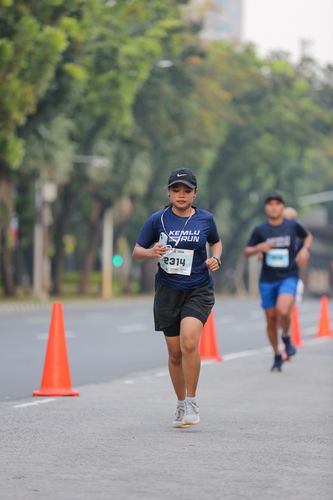Race photo from KEMLU RUN 2025