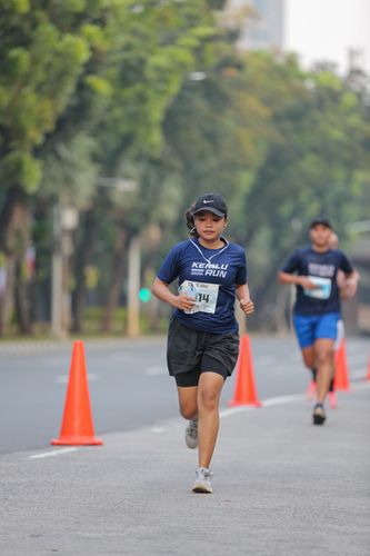Race photo from KEMLU RUN 2025