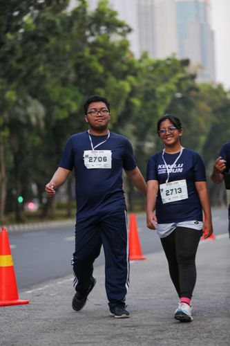 Race photo from KEMLU RUN 2025
