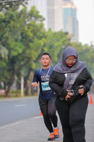 Race photo from KEMLU RUN 2025