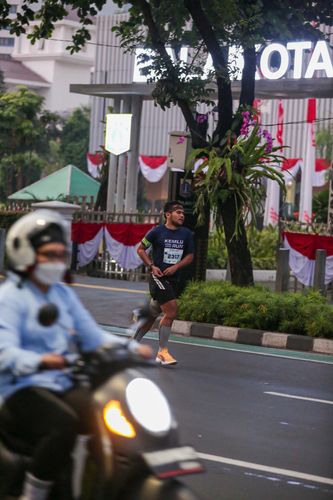 Race photo from KEMLU RUN 2025